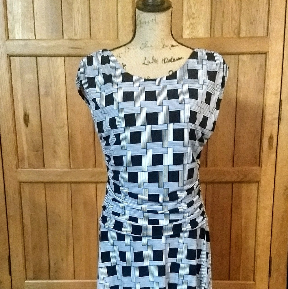 A black and white below the knee dress